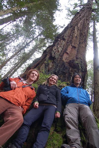 Backing against a giant Douglas fir in Francis King Regional Park