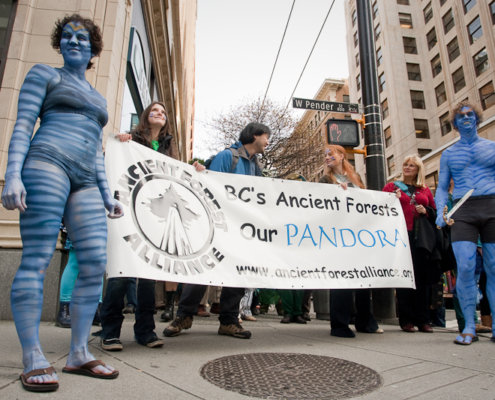 Na'vi characters rally for BC's old-growth forests on the streets and sidewalks of Vancouver.