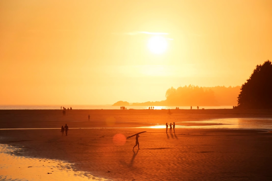 The sun sets over Chesterman Beach, Tofino, BC.